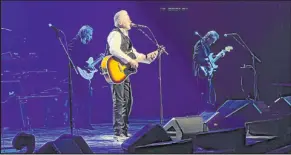  ?? Las Vegas Review-journal @Johnnykats John Katsilomet­es ?? The Eagles, with Don Henley in the spotlight, on Saturday at the MGM Grand Garden. The band performed “Hotel California” in its entirety.