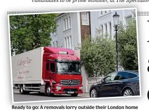 ?? ?? Ready to go: A removals lorry outside their London home