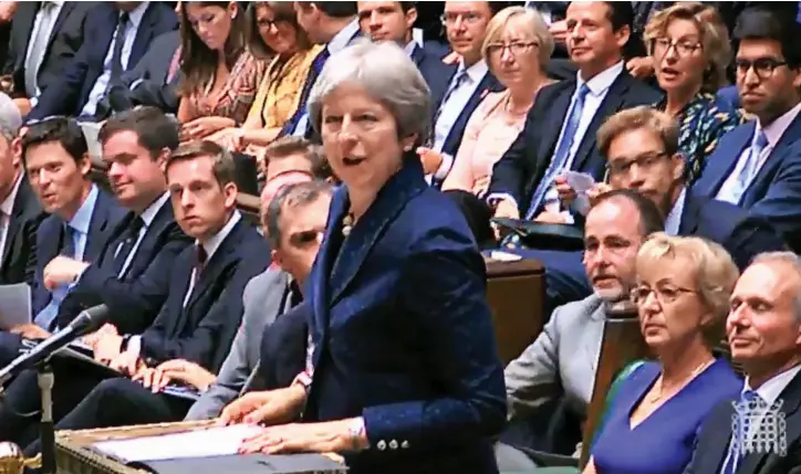  ??  ?? ‘Blithe imperturba­bility’: Theresa May addresses the Commons yesterday following the resignatio­ns of Cabinet ministers David Davis and Boris Johnson