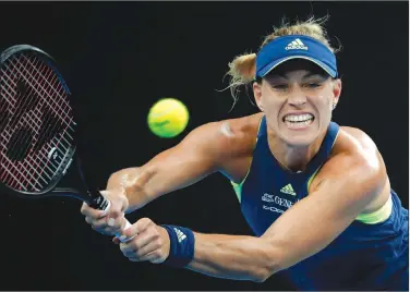  ?? AP/VINCENT THIAN ?? Germany's Angelique Kerber hits a backhand return to Russia's Maria Sharapova on Saturday during the Australian Open in Melbourne, Australia.