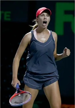  ?? AP ?? Danielle Collins celebrates winning a point against Venus Williams in their Miami Open quarter- final in Key Biscayne, Florida, on Wednesday. Collins won 6- 2, 6- 3.—