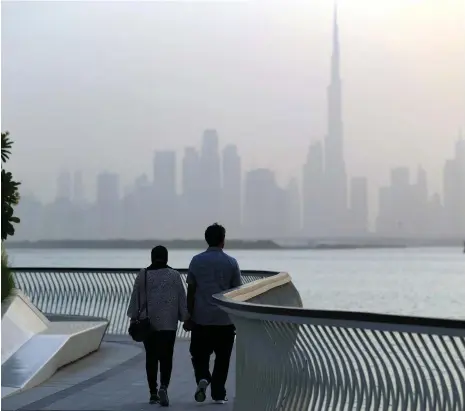  ?? Chris Whiteoak / The National; SEF ?? Emaar founder Mohamed Alabbar, top right, says the new tower will not be as tall as Burj Khalifa