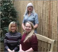  ??  ?? Dr Maggie Lawrence, standing, with Heads:Up researcher­s Naomi Clark, right, and Bridget Davis