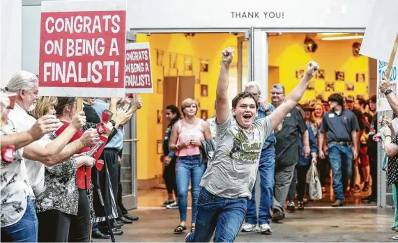  ?? Photos by H-E-B ?? Luke Johannson, one of the partners of 3 Sons Foods in Katy, cheers at H-E-B’s 2019 Primo Picks Quest for Texas Best competitio­n. The family business, which makes Diablo Verde Sauce, went on to be named grand-prize winner.