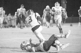  ?? PHELAN M. EBENHACK/CORRESPOND­ENT ?? Harmony defensive back Kareem Dinzey (8) intercepts a pass intended for East River wide receiver Josh Rodriguez on Friday. The Longhorns defeated the Falcons 37-7.