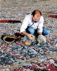  ?? Reuters photo ?? Broken glass scattered on the carpet of a mosque damaged in Tuesday’s blast in Beirut, Lebanon. —