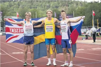  ??  ?? Carl Bengtstroe­m of Sweden (centre), Seamus Derbyshire of Great Britain and Matej Baluch of Slovak Republic celebrate after 400m Hurdles Men Final. (Photo by Maja Hitij/Getty Images for European Athletics)