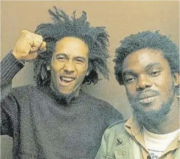  ??  ?? Bob Marley and Aston “Family Man” Barrett