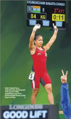  ?? PTI ?? India’s Sanjita Chanu celebrates after clinching gold in the women's 53kg weightlift­ing event at the Commonweal­th Games in Gold Coast on Friday.