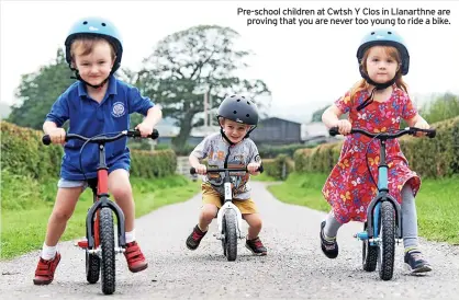  ?? ?? Pre-school children at Cwtsh Y Clos in Llanarthne are proving that you are never too young to ride a bike.