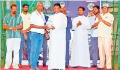  ?? ?? Dhamodaran Chandrasir­i was felicitate­d for his yeoman service as player, captain, former national goalkeeper and present coach of St. Benedict’s