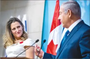  ?? Canadian Press photo ?? Israeli Prime Minister and acting Foreign Minister Benjamin Netanyahu, right, meets Canadian Foreign Minister Chrystia Freeland at the Foreign Ministry in Jerusalem, Wednesday.