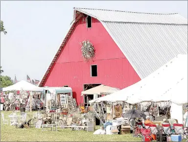  ?? FILE PHOTOS ?? Look for the big red barn off U.S. Highway 62 and you know you’ve found The Junk Ranch, a vintage fair that draws thousands of visitors and more than 100 vendors twice a year. The fall fair will be held Friday and Saturday on Centerpoin­t Road in...