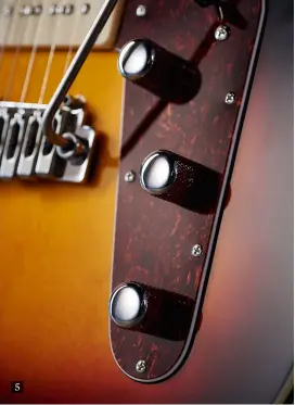  ??  ?? 5 5. Both guitars use the same control setup that includes the Bass Contour Control, a passive bass roll-off. There’s a treble bleed cap on the volume control, too 6. These Gretsch-y Revtron ’buckers (overleaf) have a clean, low output – all part of...