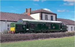  ?? Darlington Borough Council ?? Resplenden­t in BR green, D6898 stands on display outside its new home at the Head of Steam Railway Museum at Darlington on August 9, shortly after it had been delivered from Loram in Derby.