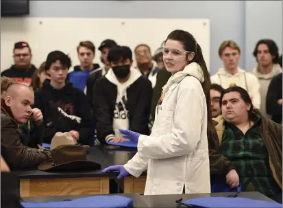  ?? PHOTOS BY JOEL ROSENBAUM — THE REPORTER ?? Solano Community College biotechnol­ogy student Elizabeth Wilson, 18, of Dixon, speaks about the advantages of attending the school and what she has gained with a group of students from Will C. Wood and Vacaville high schools Friday at California Biomanufac­turing Education Center at the college during National Career Technical Education Month.