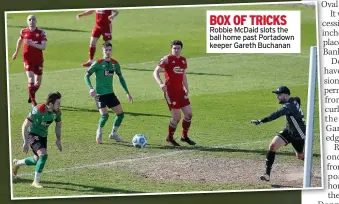  ??  ?? BOX OF TRICKS Robbie Mcdaid slots the ball home past Portadown keeper Gareth Buchanan