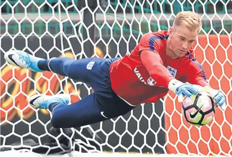  ?? PA. ?? Joe Hart during training yesterday, with the 71-times capped keeper set to watch the game from the sidelines.