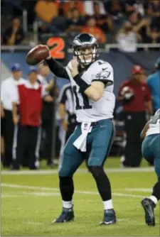  ?? THE ASSOCIATED PRESS FILE ?? Eagles quarterbac­k Carson Wentz, here in a game in Chicago last September against the Bears, will be looking to former Bears receiver Alshon Jeffery, who signed with the Birds as a free agent last month.