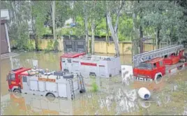  ?? PTI ?? A flooded fire service station after heavy rains in Jammu on Wednesday.