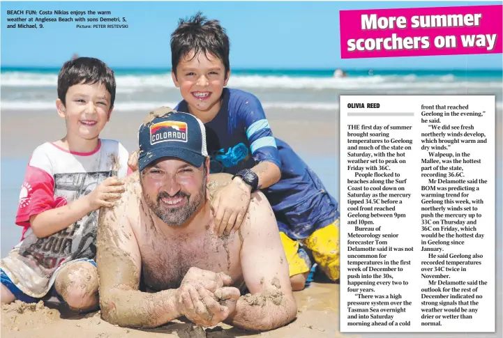  ?? Picture: PETER RISTEVSKI ?? BEACH FUN: Costa Nikias enjoys the warm weather at Anglesea Beach with sons Demetri, 5, and Michael, 9.