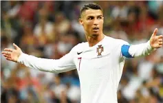  ??  ?? Cristiano Ronaldo gestures during the Russia 2018 World Cup round of 16 football match between Uruguay and Portugal at the Fisht Stadium in Sochi in this June 30 file photo. — AFP photo