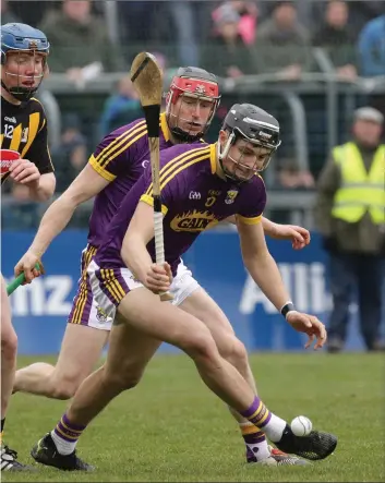  ??  ?? o the ball before Kilkenny attacker John Donnelly.