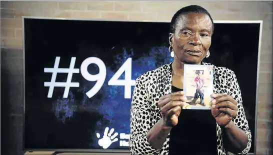  ?? PHOTO: THULANI MBELE ?? Miriam Monyane holds a picture of her son Thabo, 32, who died at Steve Biko Hospital after he got sick at Cullinan Care & Rehabilita­tion Centre on February 8 in Pretoria. Solidarity’s Helping Hand will file a class action for the affected families.