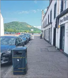  ??  ?? Scott Sweeney of outdoor clothing store MacIntyres of Inveraray took this photo - at 12.30pm on August 14 on a beautiful sunny day - of a deserted Inveraray Main Street. Asking for the support of the public, he said: ‘For anybody who doubts if the A83 Rest and be Thankful being closed/ open/closed/open/convoy working/convoy not working makes any difference to Inveraray, well here’s proof. To businesses already struggling given the circumstan­ces, this could be a fatal difference.’