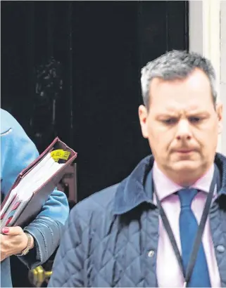  ?? PHOTO: PA ?? Uphill battle: UK Prime Minister Theresa May leaves 10 Downing Street for the House of Commons to face Prime Minister’s Questions yesterday.