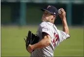  ?? CARLOS OSORIO — THE ASSOCIATED PRESS ?? Twins starting pitcher Matt Wisler throws during the first inning of a doublehead­er against the Detroit Tigers on Aug. 29, in Detroit.