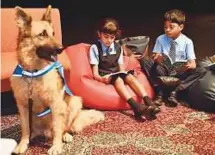  ?? Clint Egbert/Gulf News ?? Not only do dogs help children relax, they also help them try a bit harder and have fun, says Karalynn Thomson.