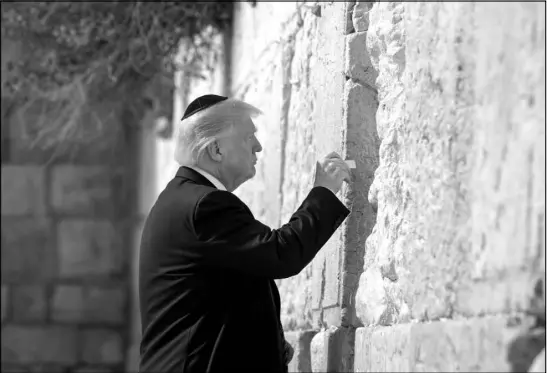  ?? STEPHEN CROWLEY / NEW YORK TIMES FILE (2017) ?? President Donald Trump visits the Western Wall in Jerusalem on May 22, 2017.