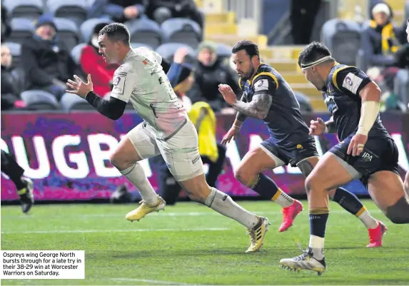  ??  ?? Ospreys wing George North bursts through for a late try in their 38-29 win at Worcester Warriors on Saturday.