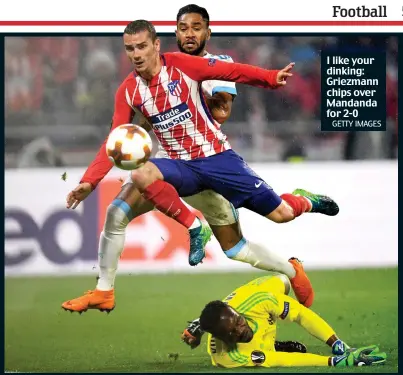  ?? GETTY IMAGES ?? I like your dinking: Griezmann chips over Mandanda for 2-0