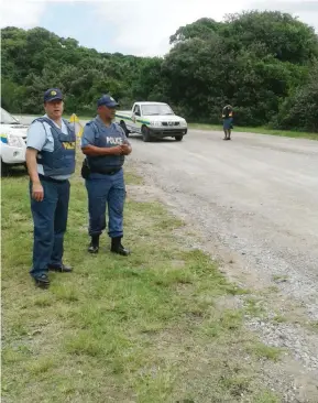  ?? Photo: Supplied ?? Police inspecting an area near Peddie, where two bodies were found on Monday .