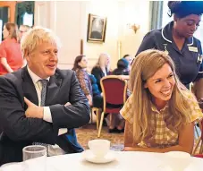  ?? Picture: PA. ?? Prime Minister Boris Johnson with partner Carrie Symonds, who will accompany him to Balmoral next month.