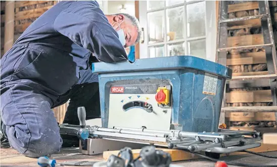  ?? ?? REPRIEVE: Government funding for Men’s Sheds, where members build various items for their communitie­s, will remain – for now.