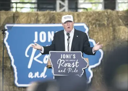  ?? Stephen Maturen/Getty Images ?? Republican presidenti­al nominee Donald Trump speaks Saturday at the second annual Joni Ernst Roast and Ride event in Des Moines, Iowa.