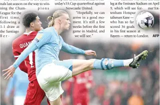  ?? AFP PHOTO ?? Manchester City’s Erling Haaland hits the ball during the English Premier League football match between Liverpool and Manchester City at Anfield in Liverpool, England, on March 10, 2024.