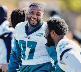  ?? Matt York/Associated Press ?? Eagles defensive tackle Javon Hargrave (97) laughs during a practice on Friday in Tempe, Ariz.