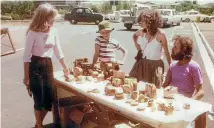  ??  ?? Nita Knight, Cathy Brosnahan and Alan Stanton at the Nelson Market’s first venue, the Millers Acre car park, in 1979. They were raising funds for the restoratio­n of Fairfield House.