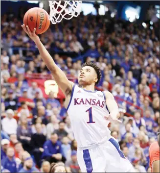  ??  ?? In this Feb 1, 2020 file photo, Kansas guard Devon Dotson (1) makes a layup during the first half of an NCAA college basketball game against Texas Tech in Lawrence, Kan. (AP)