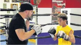  ?? SUBMITTED PHOTO ?? National Silver Gloves champion Jordan Murphy, right, displays his boxing skills during a sparring session with coach Steve Collazo at the Deerfield Beach PAL facility.