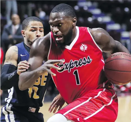  ?? DAN JANISSE ?? Juan Pattillo of the Windsor Express bypasses Maurice Jones of the St. John’s Edge during their game Wednesday at the WFCU Centre.