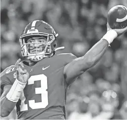  ?? VASHA HUNT/AP ?? Alabama quarterbac­k Tua Tagovailoa passes during a game last season against LSU in Tuscaloosa, Ala. Tagovailoa is a rarity in the NFL: a left-handed quarterbac­k, something the league hasn't had in several years.