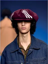  ??  ?? The flat cap, top, is having a resurgence. It features in the latest collection of Kent &amp; Curwen, the brand partowned by David Beckham, left, and was part of the Adidas MakerLab show at this year’s Paris Fashion Week, above