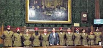  ??  ?? Military personnel attending the event in the House of Commons, including Brigadier David Southall (5th from left), MP Shailesh Vara (6th from left), Capt Jay SinghSohal (7th from left), Colonel John Kendall ( 8th from left) and Maj Sartaaj Singh...