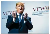  ?? DOUG MILLS / THE NEW YORK TIMES ?? President Donald Trump sings along as he takes the stage to Lee Greenwood’s “God Bless the USA” before addressing the Veterans of Foreign Wars.