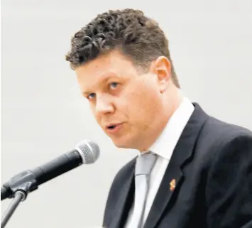  ?? JOHN SMIERCIAK / POST-TRIBUNE ?? School Superinten­dent Scott Miller addresses the parents, students, and teachers during the ribbon-cutting of the new Hammond Central High School in Hammond, Indiana, on July 22.